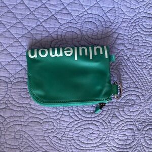 Lululemon Green Wristlet with Zip Closure and Text Detail